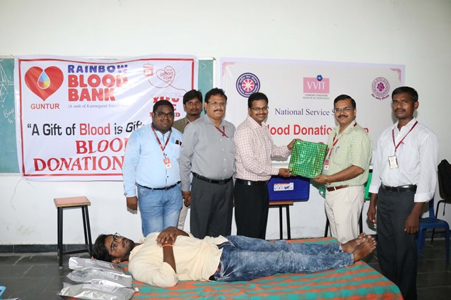 principal and nss volunterrs at camp